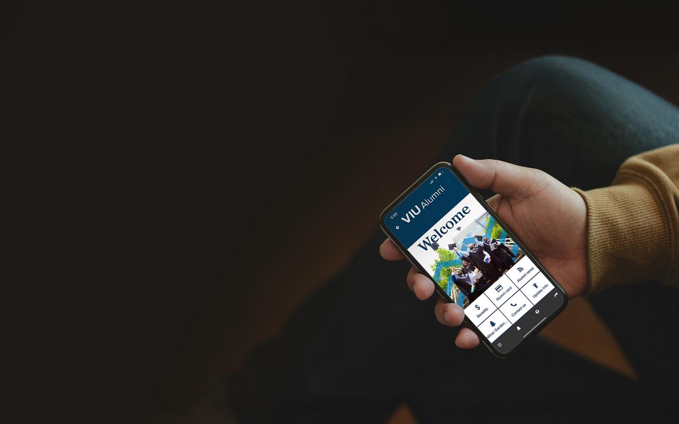 VIU Alumni App welcome sign displayed on phone